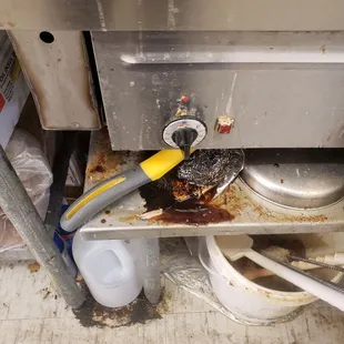 Under the grill where they make food.
