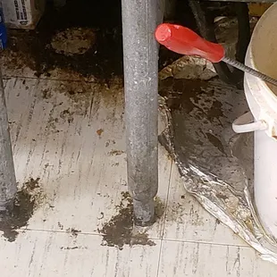 Under the griddle where they make food