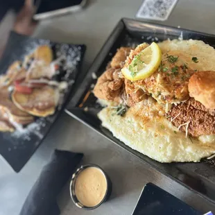 Fried catfish and shrimp over grits and French toast