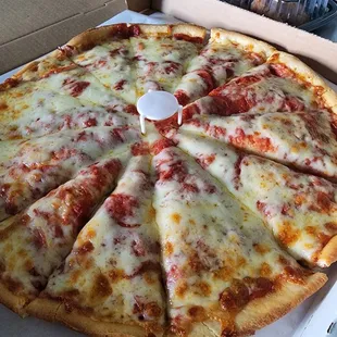 Pepperoni pizza and garlic parmesan boneless wings