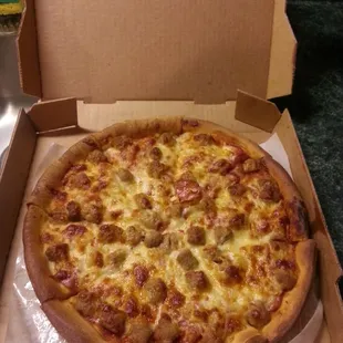 Medium regular crust, xtra sausage, pepperoni, light onion, light sauce, well done