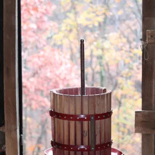 Grape press picture placed at the back of the winery.
