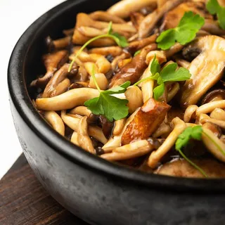 Assorted Organic Mushrooms Rice In Hot Pot