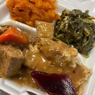 Beef pot roast, turnip greens, chicken dressing and sweet potatoes