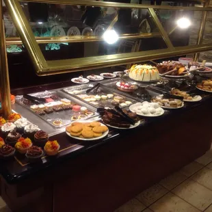 a buffet of pastries and desserts