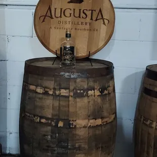 a barrel with a sign on it
