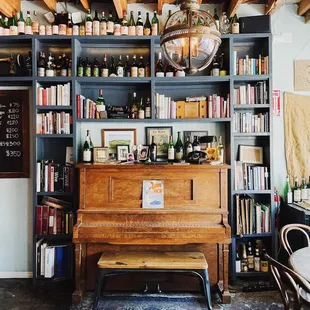 a piano in the middle of the room