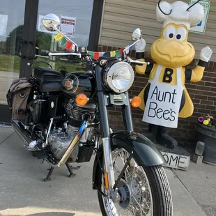 a motorcycle parked in front of a building