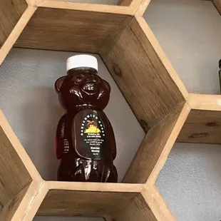 12 oz of Kansas Honey bottled in a squeezable plastic bear.