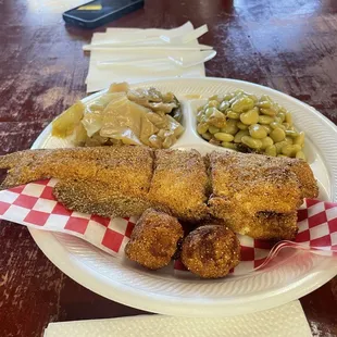 A rarity: whole catfish with the tail on!  And the hush puppies are delicious too. Cabbage and Limas