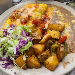 Delicious shrimp omelette. Potatoes were very tasty.