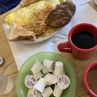 Veggie omelette sausage patties rye toast coffee