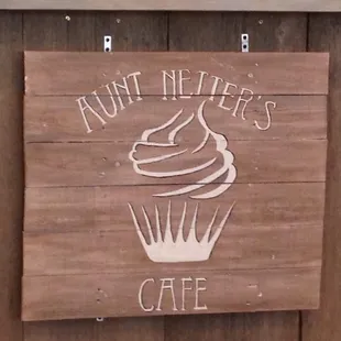a sign for a cafe