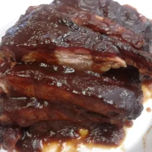 ribs served without sauce I like extra sauce though