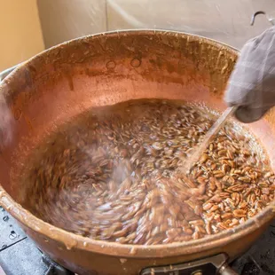 a frying pan filled with fish