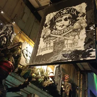 a sign hanging from the ceiling