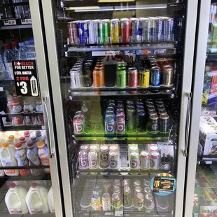 a refrigerator full of sodas