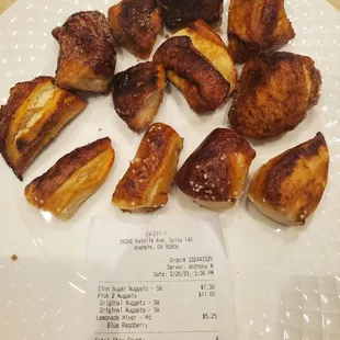 Burnt, super odd shaped nuggets and receipt