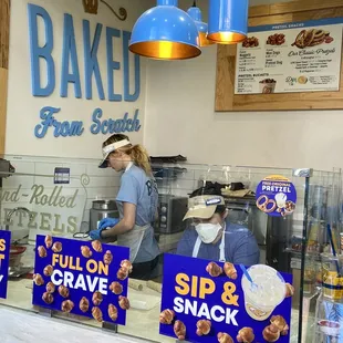 a woman behind the counter