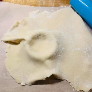 Dough for crust being rolled