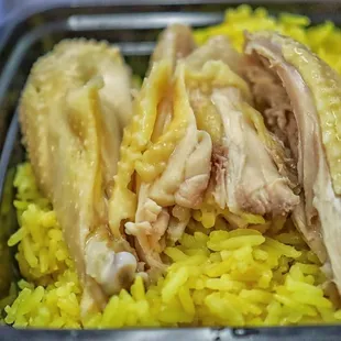  tray of yellow rice and chicken