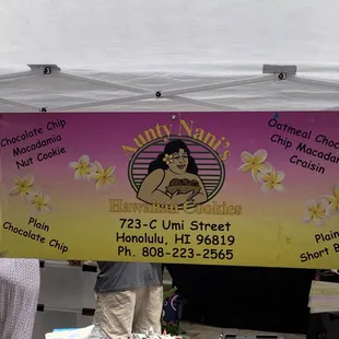 a woman holding a sign