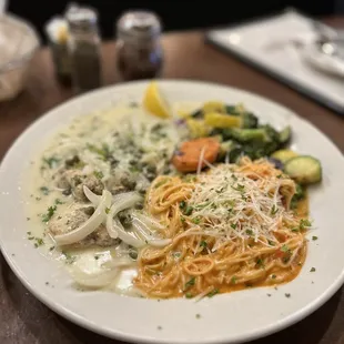 a plate of pasta and vegetables