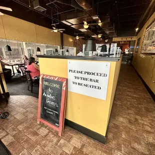 a sign in a restaurant