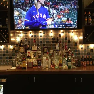 Bar area with good ol&apos; Astros on the screen.