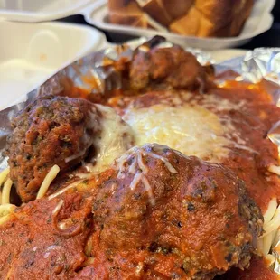 Meatballs with spaghetti in marinara sauce