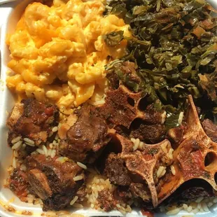 Aunties Soul Food. Oxtails, rice and Mac and cheese and collard greens.