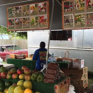 a woman selling fruit