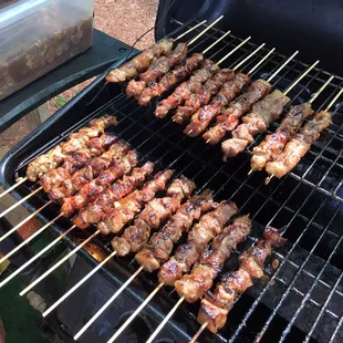 Pinoy style Pork and chicken BBQ sticks sold only on weekends and holidays. Just $2 each!