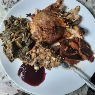 Turkey, stuffing, collard greens, and cranberry sauce