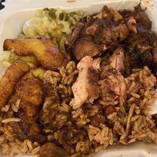 Jamaican Style Oxtail (This is the small portion) Comes with steamed cabbage, sweet plantains with Rice and Peas.