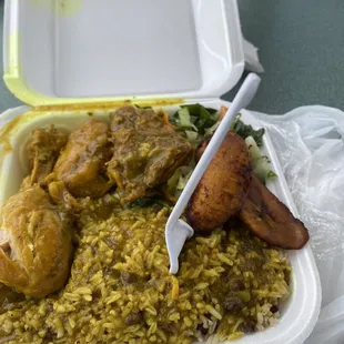 chicken and rice in a styrofoam container