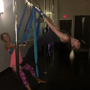 Practicing partner aerial yoga...so much fun!