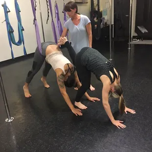 Shannon assisting with partner aerial yoga:)