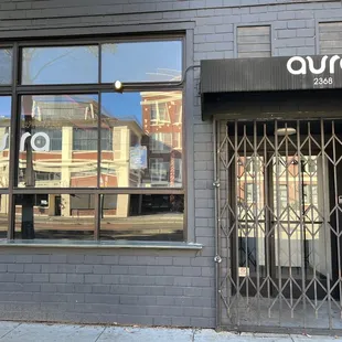 the reflection of the building across the street