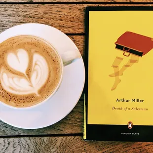 a book and a cup of coffee