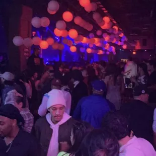 a crowd of people at a party