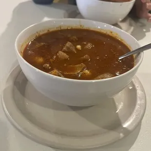 Menudo with all its fixings and homemade corn tortillas.