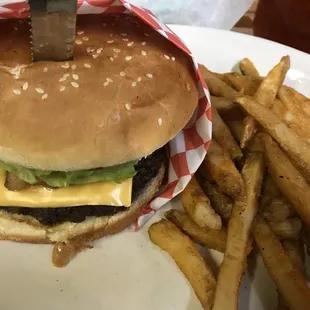 Bacon cheese burger with seasoned fries.