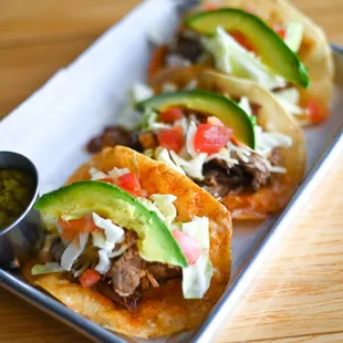 three tacos on a plate