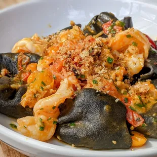 March 27 2022; Squid ink paccheri w. sea urchin, wild shrimp, tomato sugo, chili ($25).