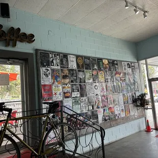 a bicycle parked in front of a coffee shop