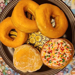 Trio of honey dipped rings. strawberry frosred and raspberry filled doughnuts (1/20/23)