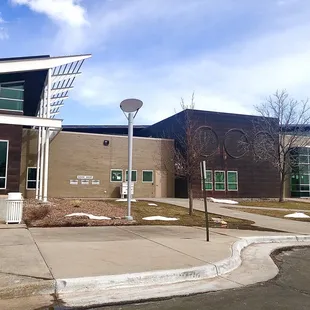 Front of library, drop boxes and curb side assistance