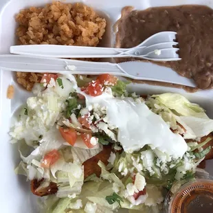 Enchilada adobada with rice and beans