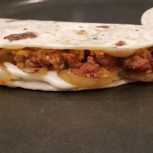 Quesadilla made with Aurora&apos;s Chorizo Picoso, Oaxaca cheese, roja salsa, and my grilled onions. So so good! 6/24/2021